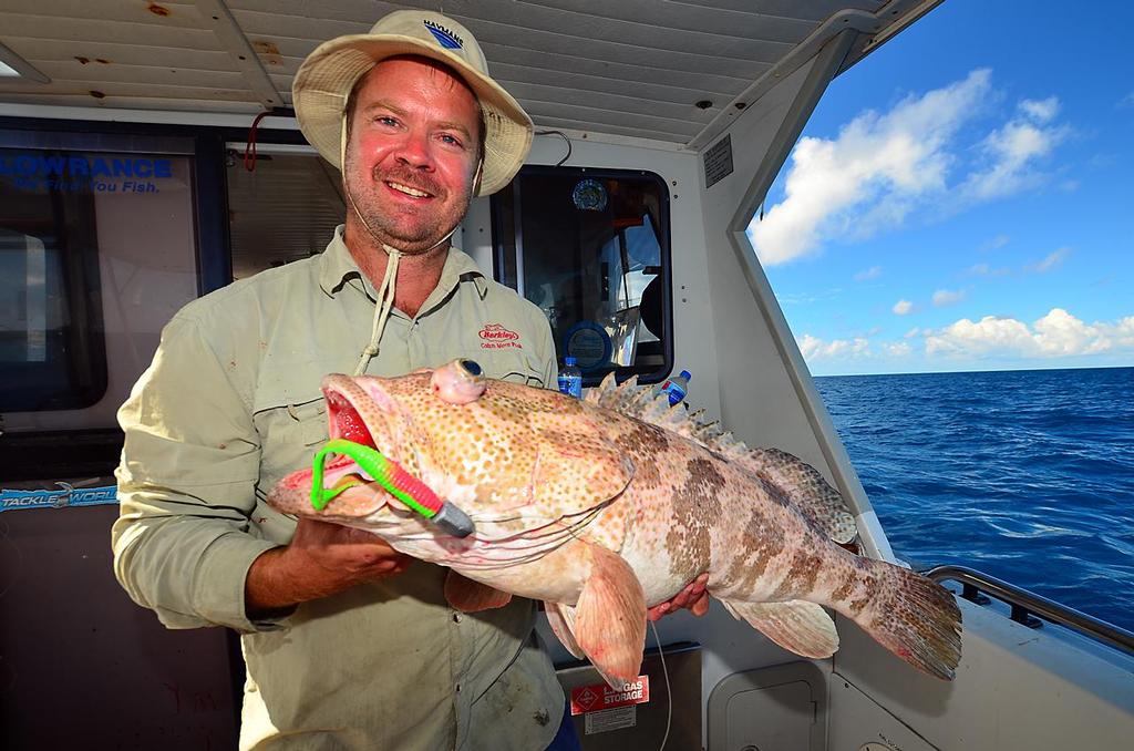 Matt Benson with his first fish on a jig, a nice cod.  This fish took a Berkley Gulp grub tail jig. © Lee Brake